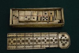 A PRISONER OF WAR BONE BOX OF DOMINOES.