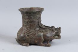 A CHINESE BRONZE ARCHAIC DRAGON VASE. 7ins high.