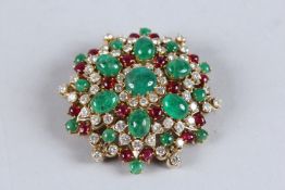 A SUPERB 18CT GOLD, EMERALD, RUBY AND DIAMOND BROOCH set with rows of diamonds and cabochon emeralds