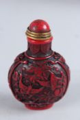 A CHINESE CINNABAR SNUFF BOTTLE.