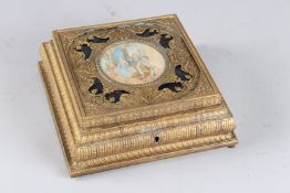 A GOOD LOUIS XVITH GILT METAL SQUARE JEWELLERY BOX, the lid with an interior mirror, the top inset