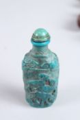 A TURQUOISE SNUFF BOTTLE.