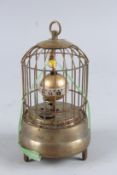 A SMALL BIRD CAGE CLOCK. 7ins high.
