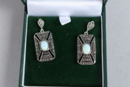 A PAIR OF SILVER, OPAL, ONYX AND MARCASITE DECO DESIGN EARRINGS.