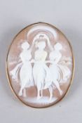AN OVAL CAMEO OF THE THREE GRACES in a gold frame. 4.5cms x 3.75cms.