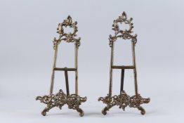 A PAIR OF BRONZE EASELS. 15ins high.