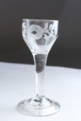 A GEORGIAN WINE GLASS with engraved bowl. 5ins high.