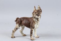 A PAINTED CAST IRON DOG DOOR STOP. 8ins high.