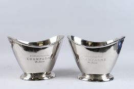 A GOOD PAIR OF OVAL CHAMPAGNE WINE COOLERS. 13ins wide.