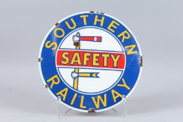 A SOUTHERN RAILWAY CIRCULAR ENAMEL SIGN. 14ins diameter.