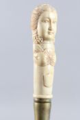 A WALKING STICK WITH A CARVED BONE HANDLE, CAPTAIN COOK.