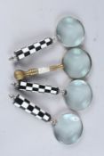 FOUR VARIOUS MAGNIFYING GLASSES.