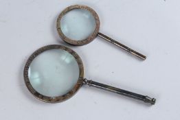 TWO REPLICA METAL 1941 MAGNIFYING GLASSES.