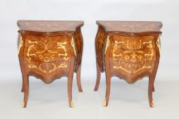 A GOOD PAIR OF LOUIS XVITH DESIGN MARQUETRY BOMBE FRONTED THREE DRAWER COMMODES with gilt metal