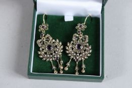 A PAIR OF 9CT GOLD AMETHYST, PERIDOT, PEARL AND DIAMOND SUFFRAGETTE COLOURS EARRINGS.