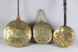 THREE DUTCH BRASS WARMING PANS.