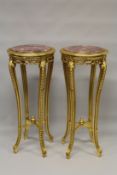 A TALL PAIR OF LOUIS XVITH STYLE GILTWOOD MARBLE TOP CIRCULAR STANDS. 3ft 6ins high x 1ft 6ins