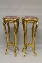 A TALL PAIR OF LOUIS XVITH STYLE GILTWOOD MARBLE TOP CIRCULAR STANDS. 3ft 6ins high x 1ft 6ins