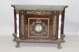 A LOUIS XVITH MARBLE TOP COMMODE with white porcelain column sides. 4ft 2ins long x 2ft 10ins high.