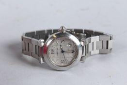 A CARTIER STEEL AUTOMATIC WRISTWATCH. No. P836842, in a red Cartier box.