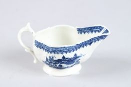 A SMALL CAUGHLEY BLUE AND WHITE SAUCEBOAT, CIRCA 1790 - 1792. Fishermen or Pleasure Boat pattern.