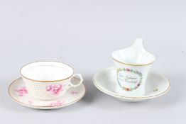 A KPM ROSES CUP AND SAUCERS and A BERLIN CUP AND SAUCER.