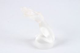 A LALIQUE FROSTED GLASS NUDE on a circular base. 5ins high. Engraved Lalique, France.