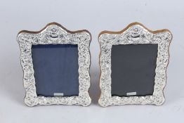 A PAIR OF SILVER PHOTOGRAPH FRAMES.