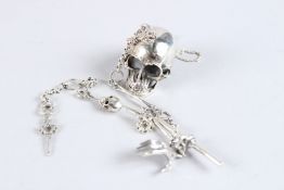A SILVER SKULL AND CHAIN.
