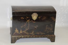 AN 18TH CENTURY ORIENTAL DESIGN DOMED TOP CABINET on a base with bracket feet, the sides with