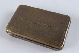 A BRASS COCAINE BOX.