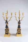 A GOOD PAIR OF REGENCY GILT METAL AND BRONZE CANDELABRA with female figures, each with three