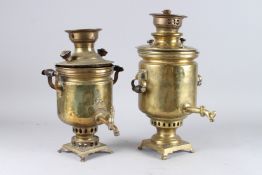 TWO BRASS SAMOVARS. 16ins high.