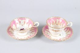 TWO PAIRS OF FLOWER AND PINK GROUND CUPS AND SAUCERS.