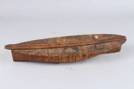 AN EARLY SEGMENTED WOOD HULL OF A BOAT. 15ins long.