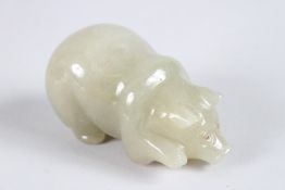 A GOOD CARVED JADE RUSSIAN PIG. 4ins long, in a Faberge box.
