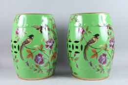 A GOOD PAIR OF CHINESE DESIGN PORCELAIN BARREL SEATS.
