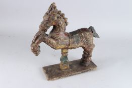AN ANTIQUE INDIAN CARVED WOOD AND PAINTED HORSE STATUE 