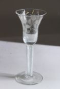 A GOOD GEORGIAN WINE GLASS, the bowl engraved with flowers and insects.