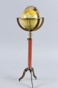 A REPLICA GLOBE ON A STAND. 17ins high.