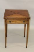 AN EDWARDIAN MAHOGANY ENVELOPE CARD TABLE with green baize cover, single drawer, supported on