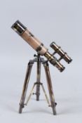 A SMALL REPLICA TELESCOPE ON A STAND.