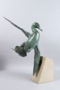 VICTOR CLIVE HAYTON (b1945) A life size patinated cast bronze figure of a Mallard Duck, on
