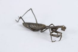 A JAPANESE OKIMONO BRONZE PRAYING MANTIS with articulated body.