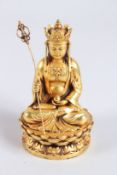 A GOLD PLATED ALLOY STATUE OF KSITIGARBHA BODHISATTVA, a prominent figure in East Asian Buddhism.