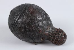 A VERY GOOD INDO PORTUGESE CARVED NUT. 6ins long.