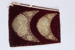 A PAIR OF OTTOMAN TURKISH METAL THREAD SLIPPER TOPS mounted on a silk background.