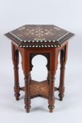 A SPANISH ISLAMIC OCTAGONAL INLAID TABLE with inlay and calligraphy. 18ins high x 14ins wide.