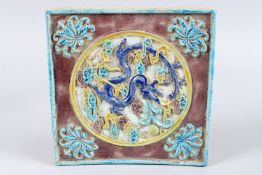 A CHINESE POLYCHROME TEMPLE TILE DECORATION DRAGON.