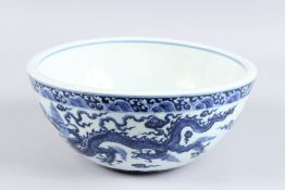 A CHINESE BLUE AND WHITE DRAGON BOWL.
